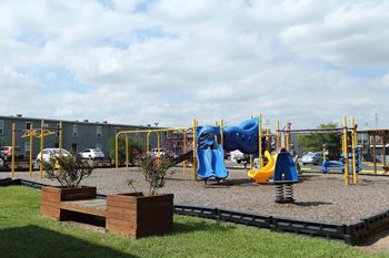 Community playground area at Willow Creek Apartments, Texas